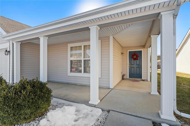 property entrance with covered porch