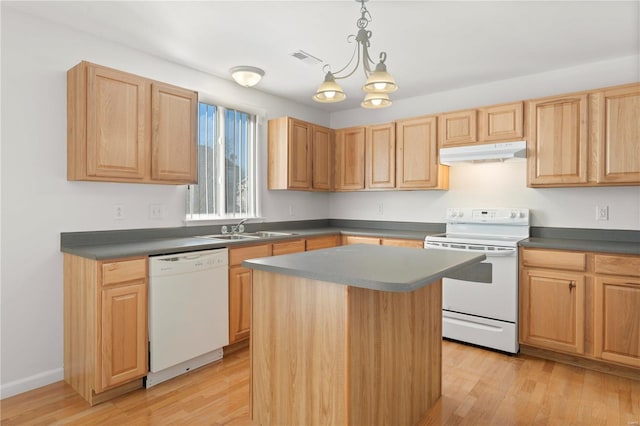 kitchen with sink, a center island, hanging light fixtures, white appliances, and light hardwood / wood-style floors