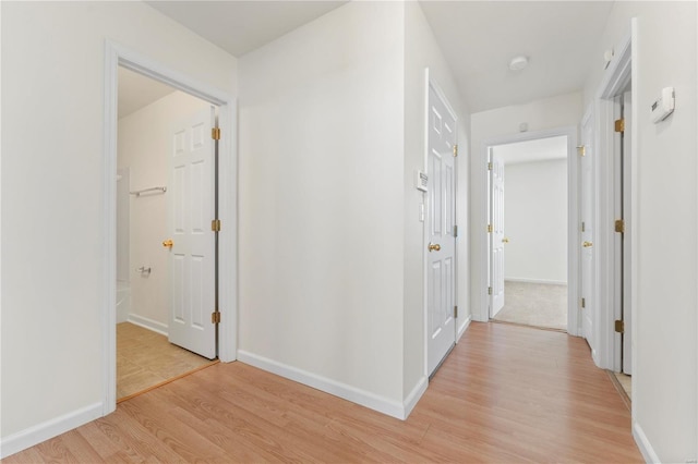 hall featuring light hardwood / wood-style floors