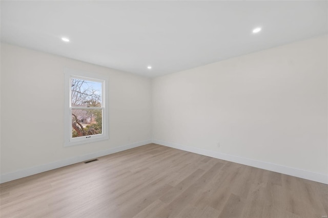 empty room with light wood-type flooring