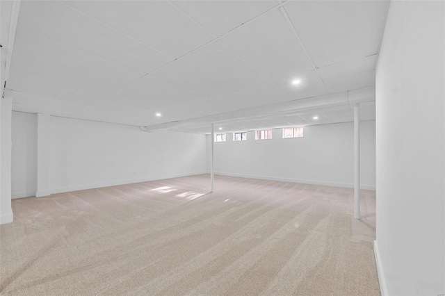 basement with carpet flooring