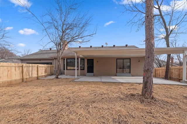 rear view of house featuring a patio