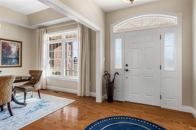 entrance foyer featuring hardwood / wood-style floors