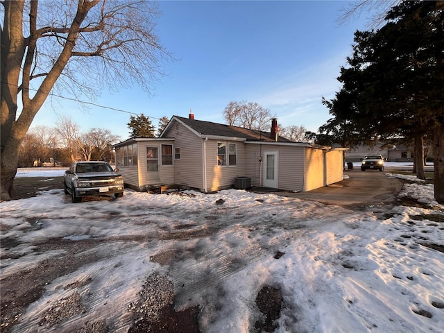 view of snow covered property