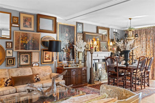 living room with ornamental molding and a fireplace