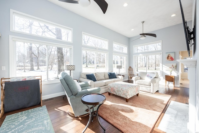 sunroom / solarium with ceiling fan