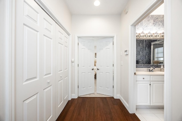 doorway to outside with hardwood / wood-style floors and a wealth of natural light