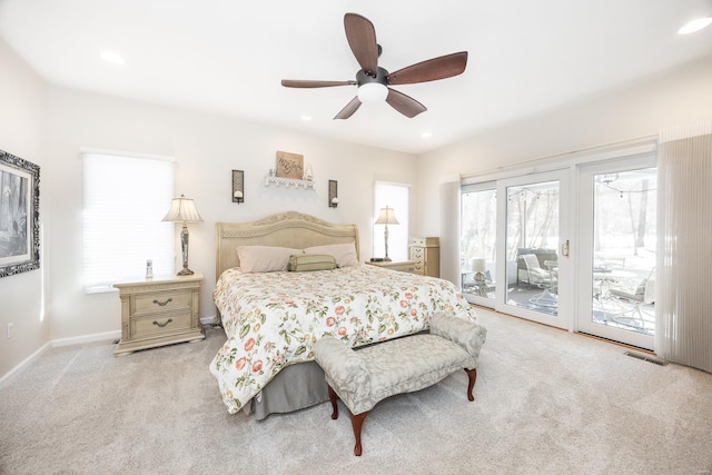 carpeted bedroom featuring ceiling fan and access to outside