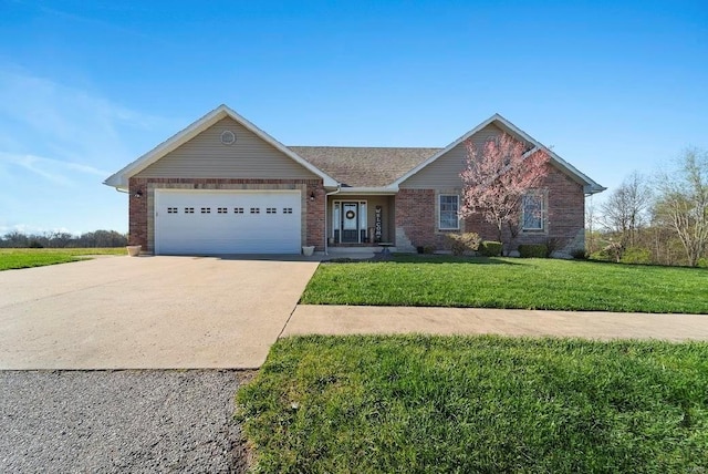 single story home with a garage and a front yard