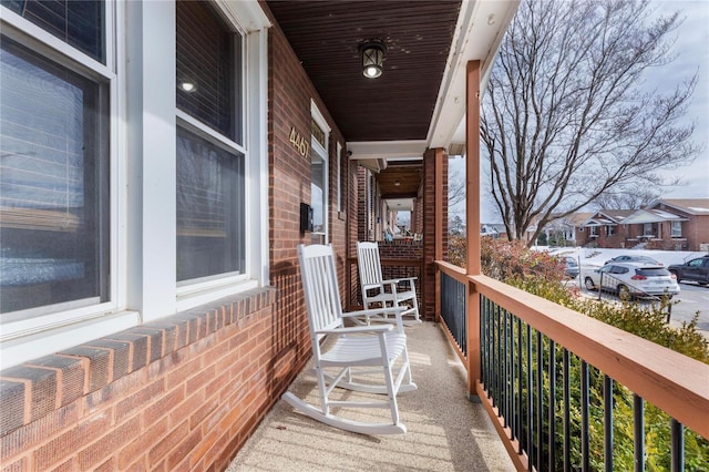 balcony featuring covered porch