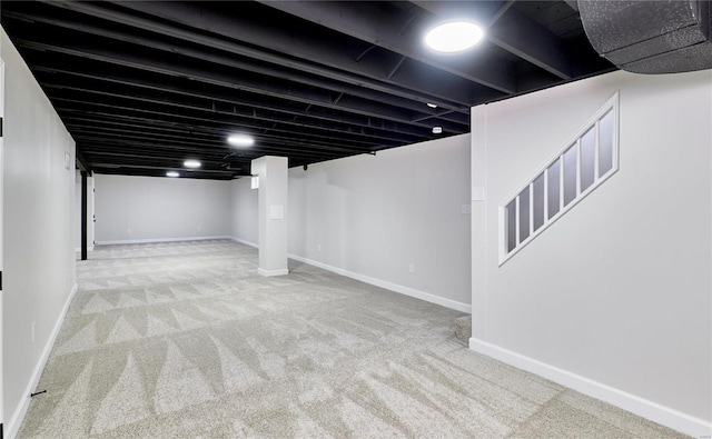 basement with carpet flooring