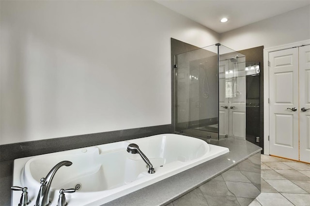 bathroom featuring plus walk in shower