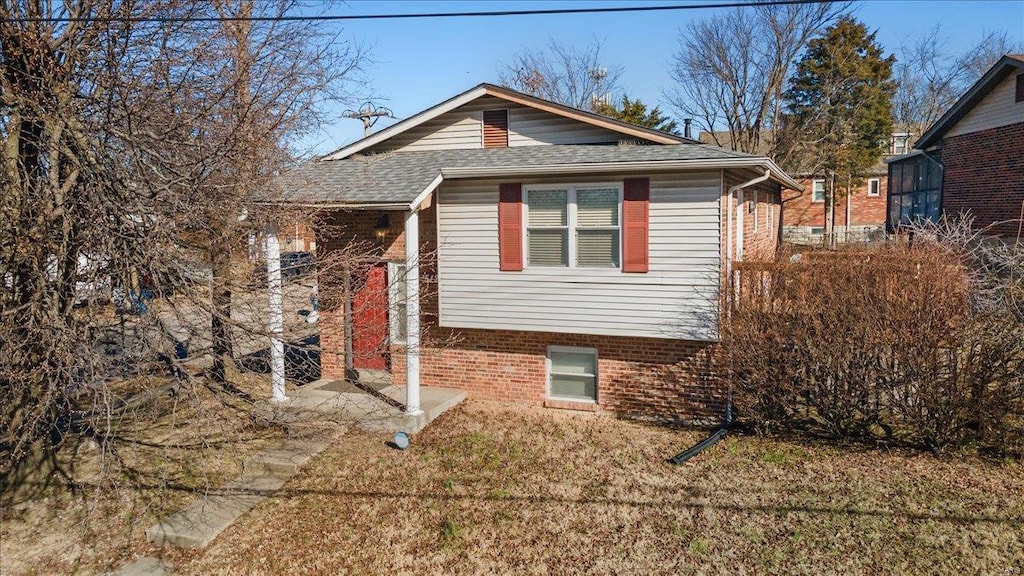 view of home's exterior featuring a yard