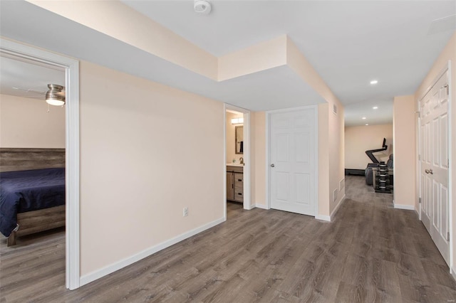 hallway featuring hardwood / wood-style floors