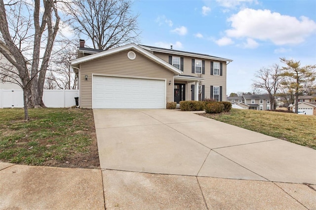 view of front facade featuring a garage and a front yard