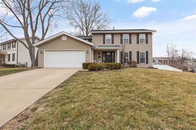 view of front of property featuring a garage and a front yard