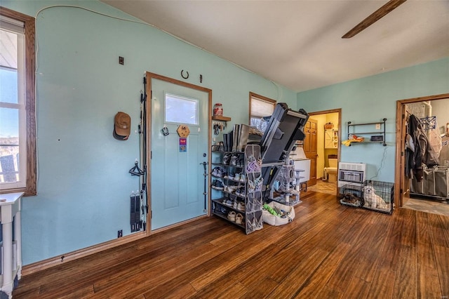 misc room with wood-type flooring and plenty of natural light