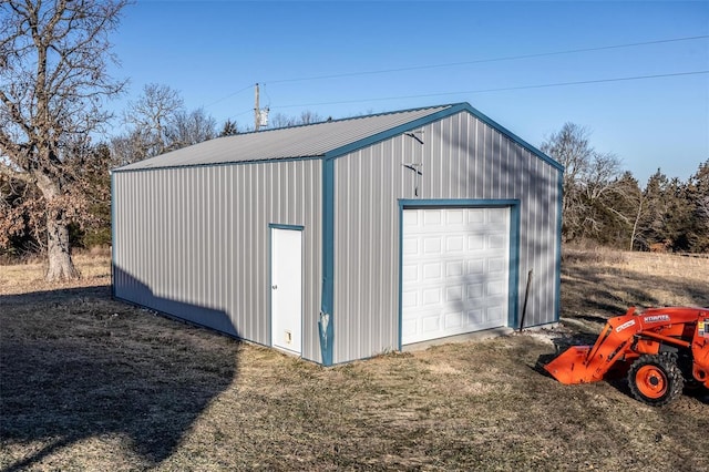 view of outbuilding featuring a garage