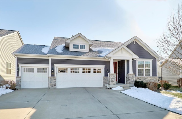 craftsman inspired home featuring a garage