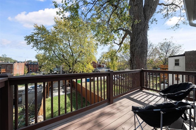 wooden terrace featuring grilling area