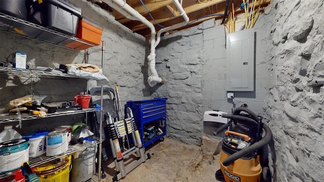 interior space featuring concrete flooring and electric panel