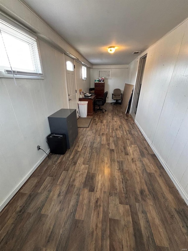 office with dark hardwood / wood-style floors