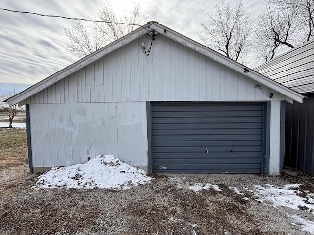 view of snow covered garage