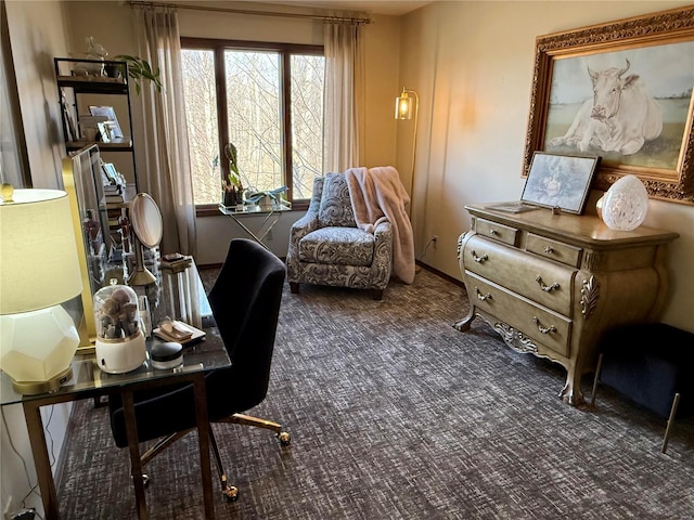 sitting room featuring dark carpet