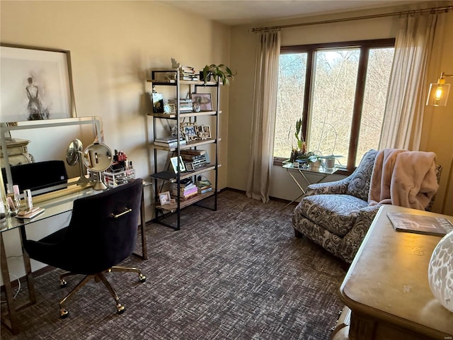 home office featuring dark colored carpet