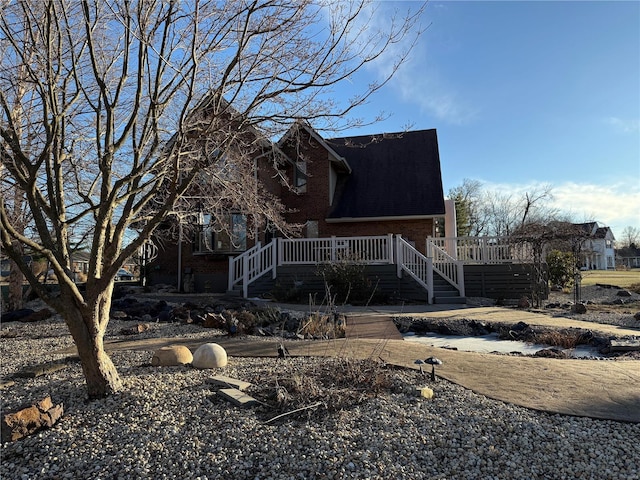 rear view of house with a deck