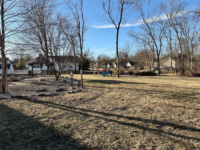 view of yard with a gazebo and a playground