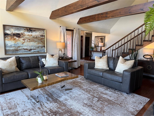 living area with vaulted ceiling with beams, stairway, and hardwood / wood-style flooring
