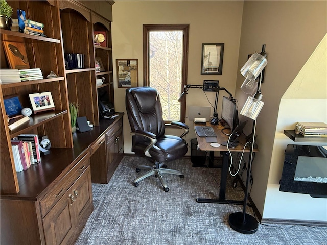 office space featuring dark carpet