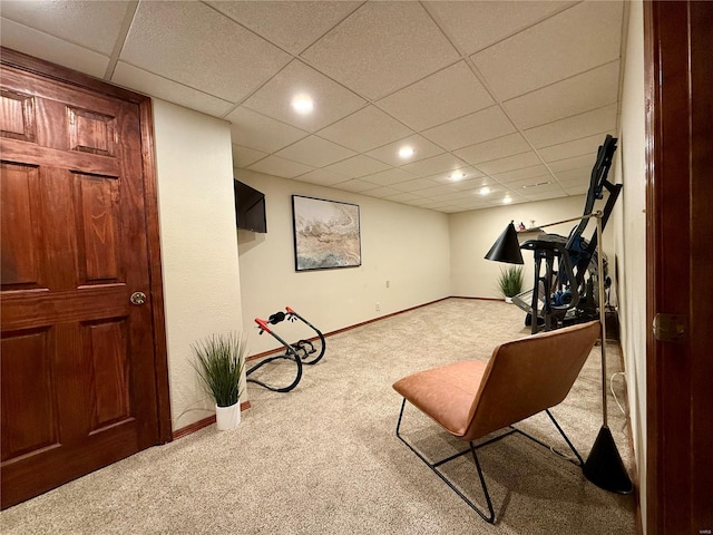 living area with a paneled ceiling, baseboards, recessed lighting, and carpet flooring