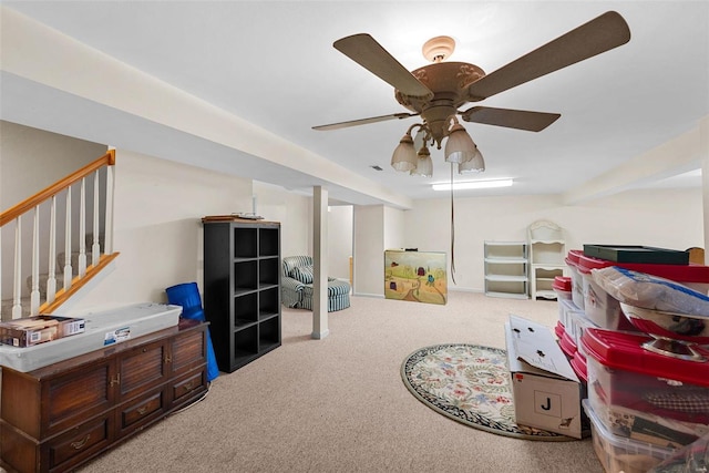 recreation room with carpet flooring and ceiling fan