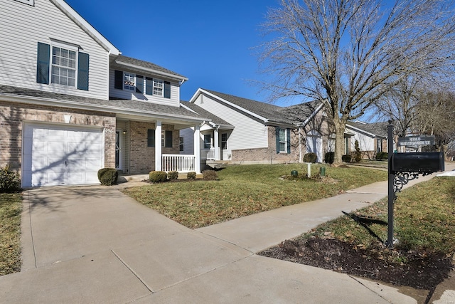 view of front of home featuring a garage, a porch, and a front yard