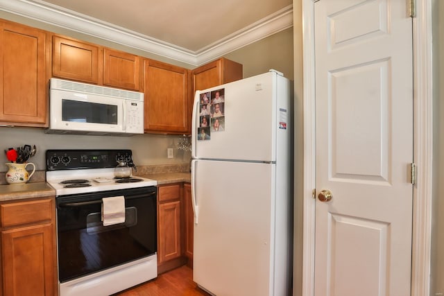 kitchen featuring crown molding, white appliances, and light hardwood / wood-style flooring