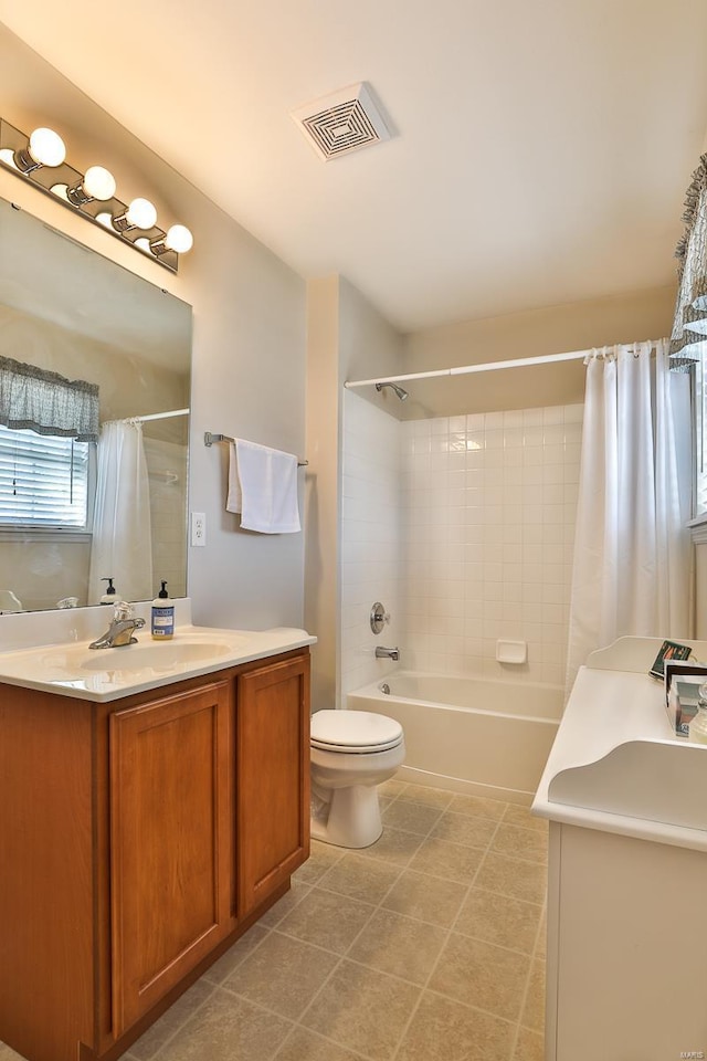 full bathroom featuring shower / tub combo with curtain, vanity, toilet, and tile patterned floors