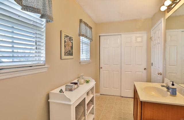 bathroom featuring vanity and tile patterned flooring