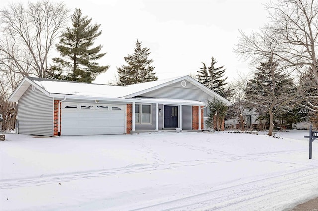 view of snow covered garage