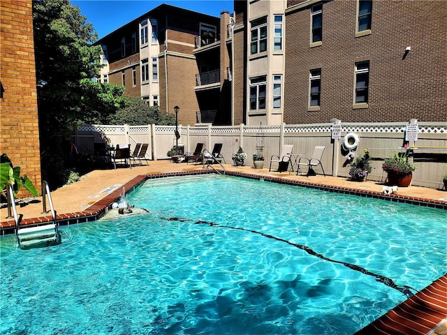 view of pool featuring a patio