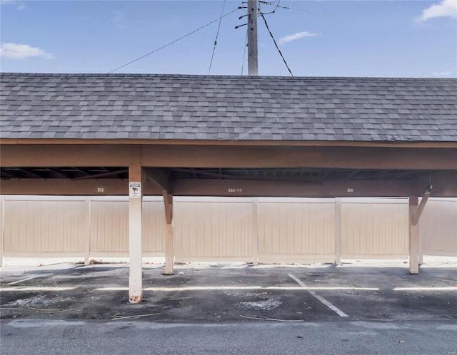 view of parking with a carport