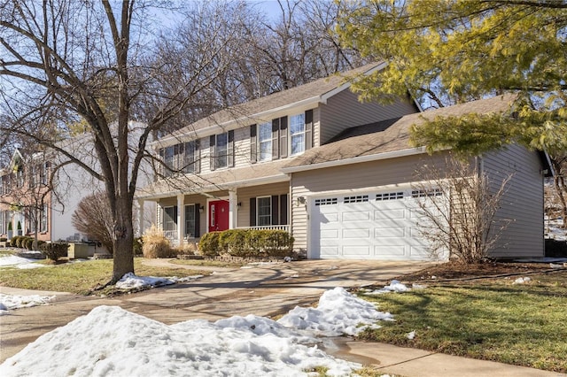 colonial home featuring a garage