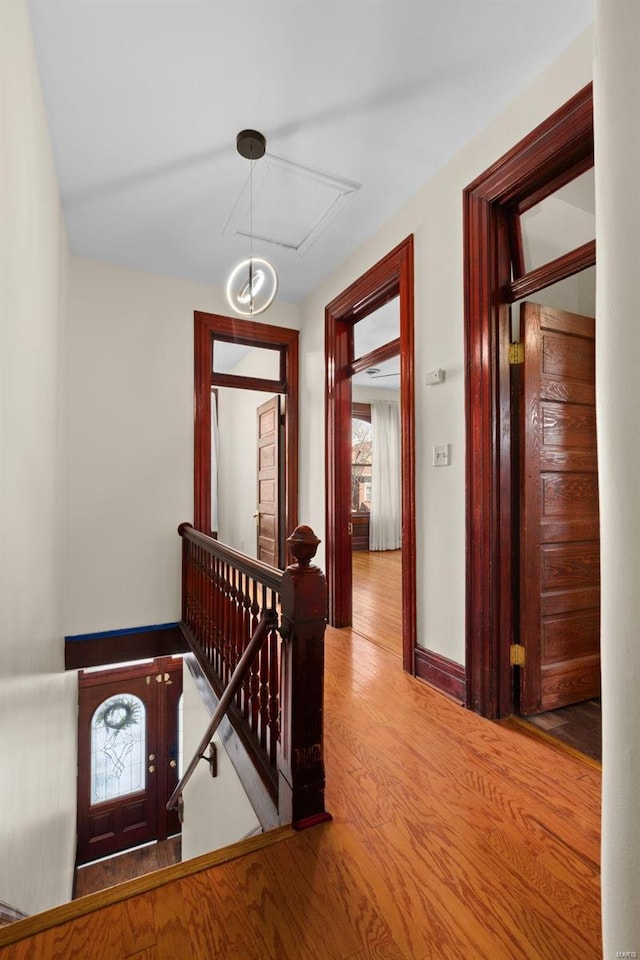 hallway featuring hardwood / wood-style floors