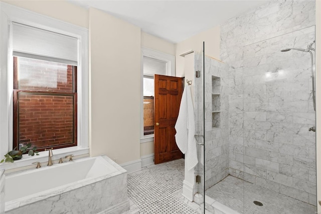 bathroom featuring tile patterned flooring, plenty of natural light, and shower with separate bathtub