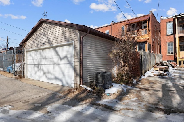 view of snow covered garage