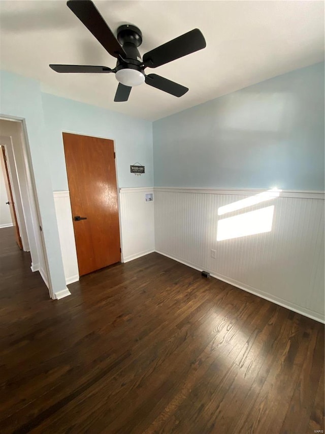 empty room featuring dark hardwood / wood-style floors