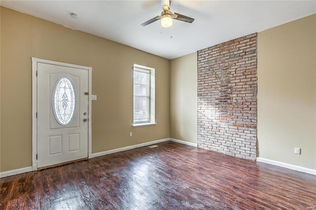 entryway with dark wood-type flooring and ceiling fan