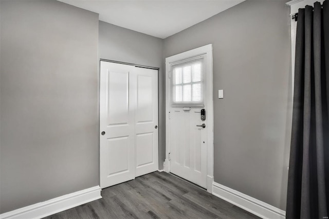 foyer entrance featuring dark hardwood / wood-style flooring