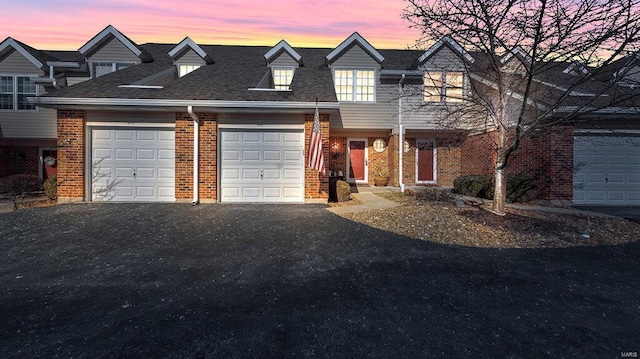 view of front of property featuring a garage